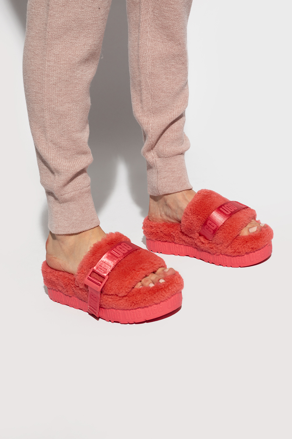 Pink fluffita best sale ugg slides